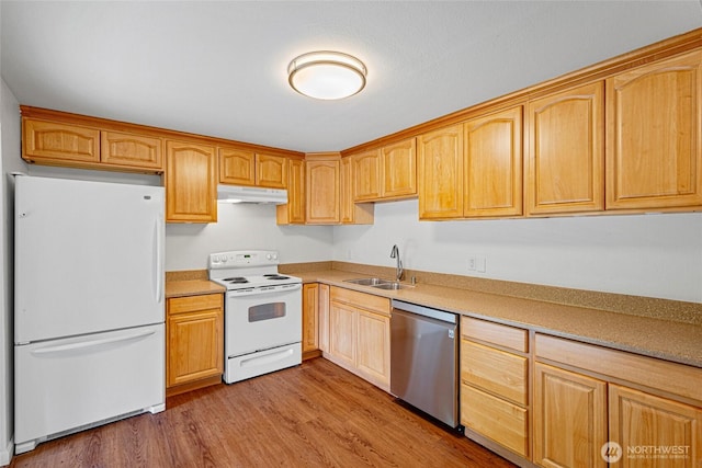 20302 52nd Ave W, Lynnwood, WA 98036 - kitchen featuring white appliances, under cabinet range hood, a sink, wood finished floors, and light countertops