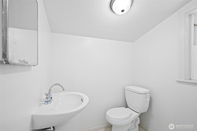 20302 52nd Ave W, Lynnwood, WA 98036 - bathroom featuring a sink, toilet, and baseboards