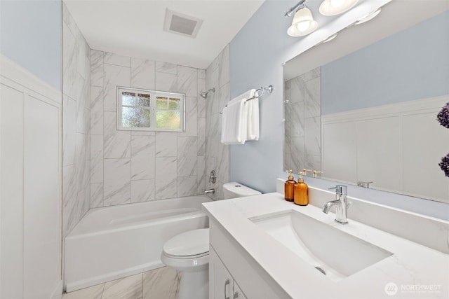 full bath with toilet, vanity, and  shower combination