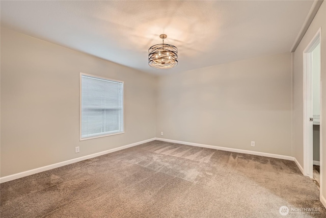 12814 NE 190th Pl, Bothell, WA 98011 - carpeted spare room with a chandelier and baseboards