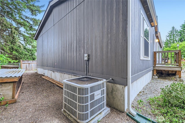 12814 NE 190th Pl, Bothell, WA 98011 - view of side of property with central AC unit and fence