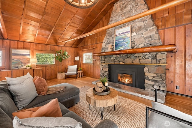 1414 Roy Rd, Bellingham, WA 98229 - living room with wood finished floors, wooden walls, wooden ceiling, and a fireplace