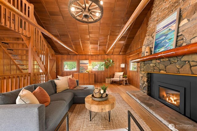 1414 Roy Rd, Bellingham, WA 98229 - living area with wooden ceiling, hardwood / wood-style flooring, a fireplace, and wooden walls