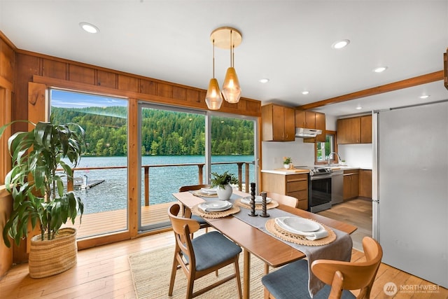 1414 Roy Rd, Bellingham, WA 98229 - dining room with a water view, light wood finished floors, and recessed lighting