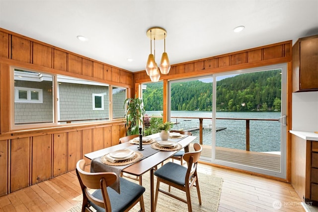 1414 Roy Rd, Bellingham, WA 98229 - sunroom / solarium featuring a water view, a wooded view, and a chandelier