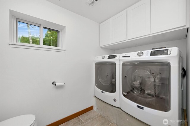 1414 Roy Rd, Bellingham, WA 98229 - laundry area with independent washer and dryer, baseboards, and cabinet space