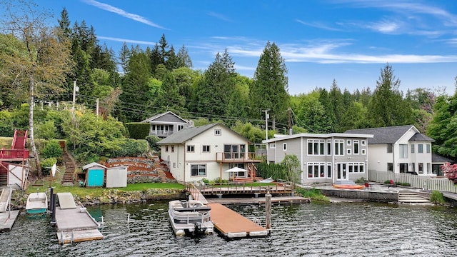 1414 Roy Rd, Bellingham, WA 98229 - dock with a deck with water view, stairs, and a wooded view