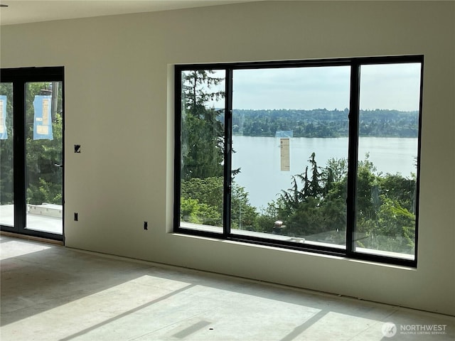 6950 SE Maker St, Mercer Island, WA 98040 - empty room with plenty of natural light and a water view