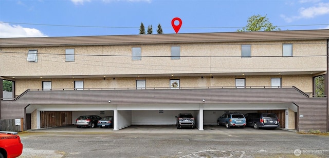 15314 4th Ave SW Unit 3, Burien, WA 98166 - view of property featuring covered parking