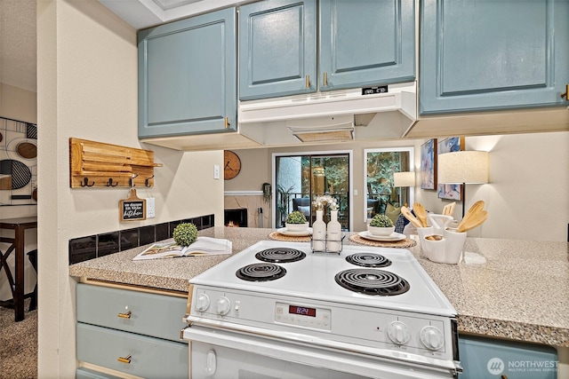15314 4th Ave SW Unit 3, Burien, WA 98166 - kitchen featuring blue cabinets, white electric range, under cabinet range hood, and light countertops