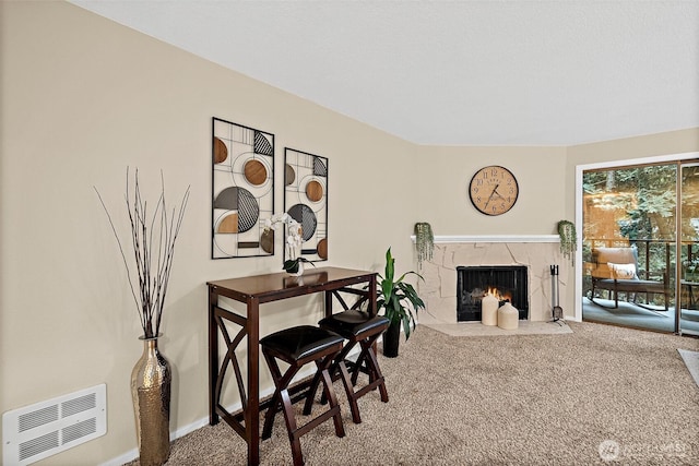 15314 4th Ave SW Unit 3, Burien, WA 98166 - dining space with carpet flooring, a high end fireplace, and baseboards