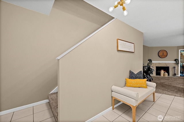 15314 4th Ave SW Unit 3, Burien, WA 98166 - staircase featuring tile patterned floors, a fireplace, and baseboards