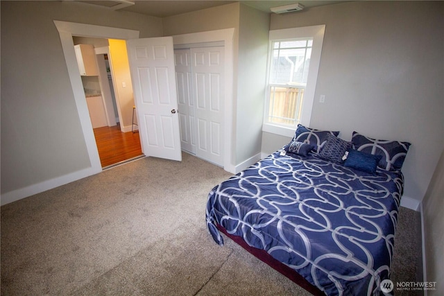 231 Karr Ave, Hoquiam, WA 98550 - bedroom featuring carpet flooring, baseboards, and a closet
