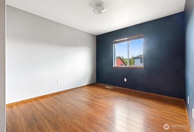 167 Wind River Rd, Chehalis, WA 98532 - unfurnished room featuring wood finished floors and baseboards