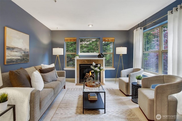 20802 72nd Ave W Unit 304, Edmonds, WA 98026 - carpeted living room with plenty of natural light, a fireplace, and baseboards