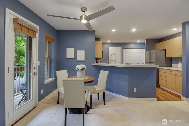 20802 72nd Ave W Unit 304, Edmonds, WA 98026 - dining space featuring baseboards, light colored carpet, a ceiling fan, and recessed lighting