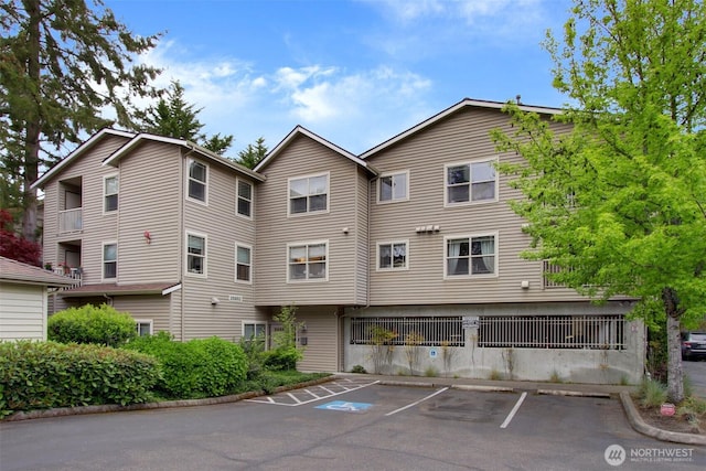 20802 72nd Ave W Unit 304, Edmonds, WA 98026 - view of building exterior with uncovered parking