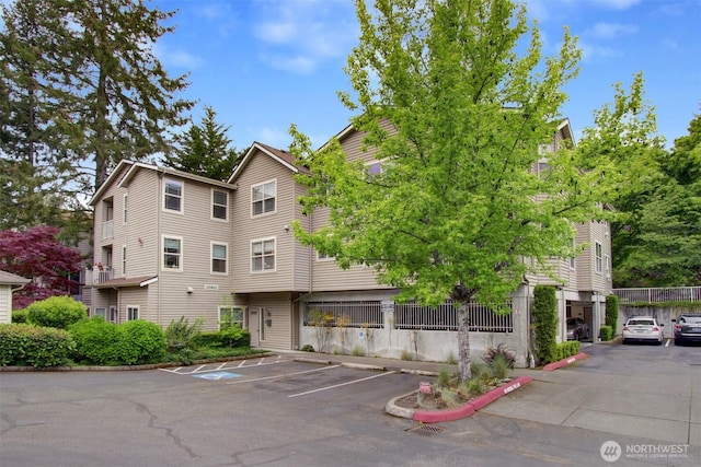 20802 72nd Ave W Unit 304, Edmonds, WA 98026 - view of building exterior featuring uncovered parking