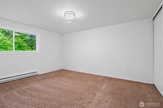 12211 SE 59th St Unit 61, Bellevue, WA 98006 - carpeted spare room with baseboard heating