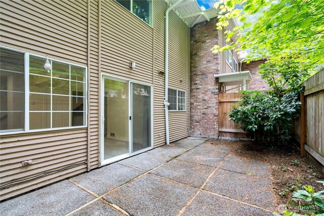 12211 SE 59th St Unit 61, Bellevue, WA 98006 - view of patio with fence