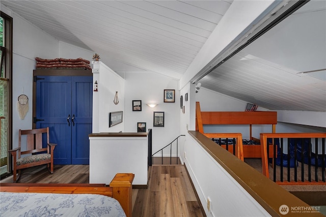 735 E Promontory Rd, Shelton, WA 98584 - bedroom with lofted ceiling and wood finished floors
