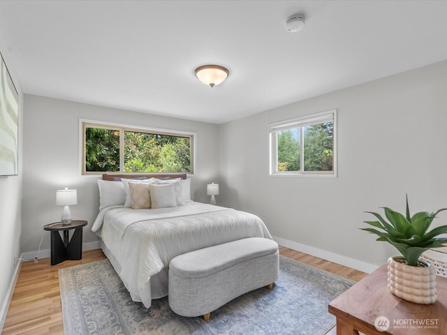 8711 Bowdoin Way, Edmonds, WA 98026 - bedroom featuring light wood-style flooring and baseboards