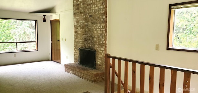 22930 115th Ave SW, Vashon, WA 98070 - carpeted living room featuring a fireplace