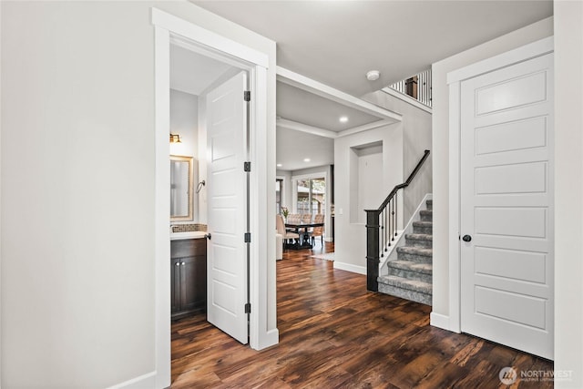 6410 83rd Avenue Ct W, University Place, WA 98467 - corridor featuring dark wood finished floors, stairs, baseboards, and recessed lighting