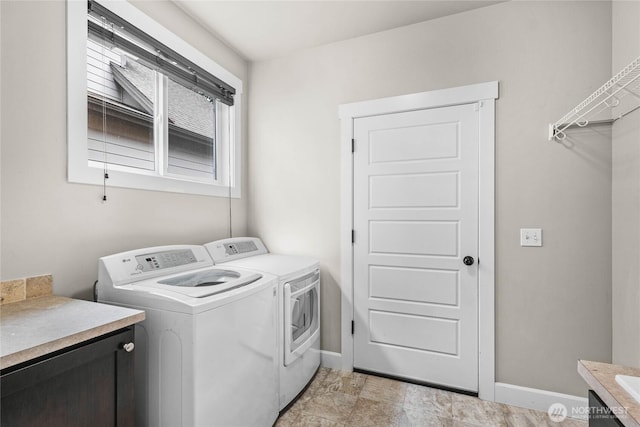 6410 83rd Avenue Ct W, University Place, WA 98467 - laundry area with separate washer and dryer and baseboards