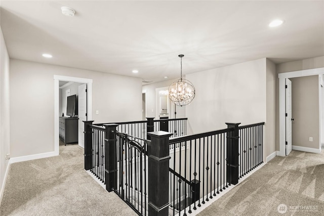 6410 83rd Avenue Ct W, University Place, WA 98467 - corridor with an upstairs landing, carpet, baseboards, recessed lighting, and a chandelier