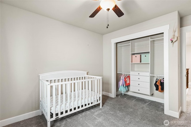 6410 83rd Avenue Ct W, University Place, WA 98467 - carpeted bedroom with a crib, a closet, baseboards, and a ceiling fan