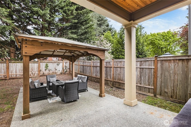 6410 83rd Avenue Ct W, University Place, WA 98467 - fenced backyard with a gazebo, a patio area, and an outdoor hangout area