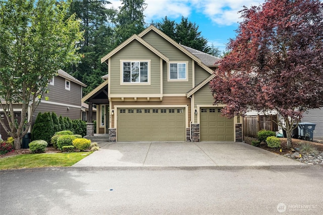 6410 83rd Avenue Ct W, University Place, WA 98467 - view of front of property with stone siding, a garage, and driveway