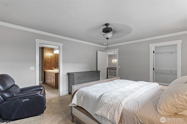6410 83rd Avenue Ct W, University Place, WA 98467 - bedroom featuring crown molding, a sink, a closet, light carpet, and baseboards