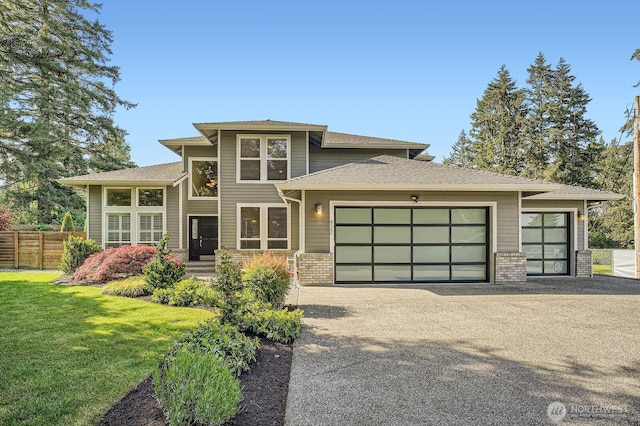 922 Chelan Ave NE, Renton, WA 98059 - prairie-style home with an attached garage, brick siding, and asphalt driveway