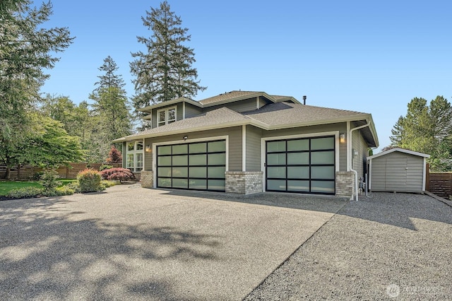 922 Chelan Ave NE, Renton, WA 98059 - view of front of home featuring brick siding, fence, a shingled roof, an attached garage, and asphalt driveway