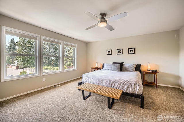 922 Chelan Ave NE, Renton, WA 98059 - bedroom with carpet, baseboards, and ceiling fan