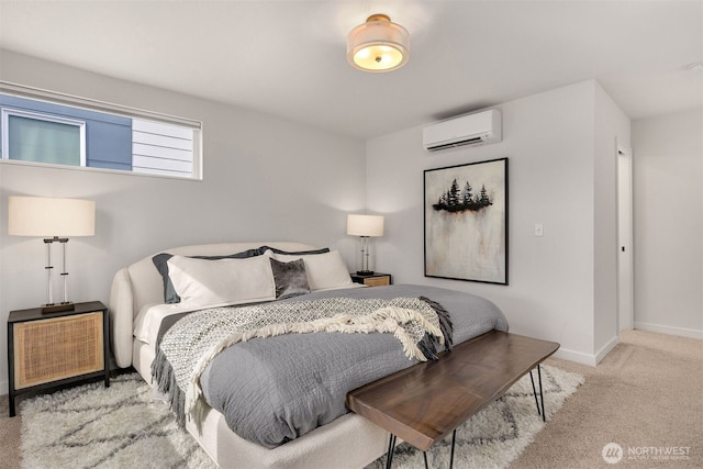 919 N 103rd St Unit A, Seattle, WA 98133 - bedroom featuring an AC wall unit, carpet, and baseboards