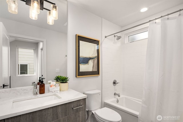 919 N 103rd St Unit A, Seattle, WA 98133 - bathroom with plenty of natural light, toilet, vanity, shower / bathtub combination with curtain, and recessed lighting
