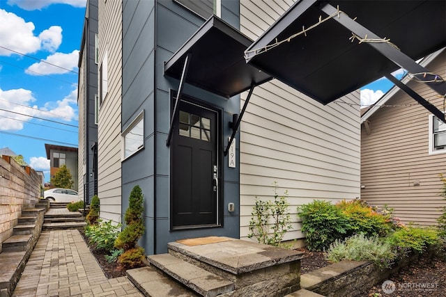 919 N 103rd St Unit A, Seattle, WA 98133 - doorway to property featuring fence