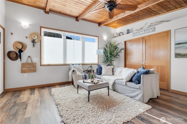 14207 Evergreen Way, Stanwood, WA 98292 - living room with wooden ceiling with exposed beams, ceiling fan, wood finished floors, and baseboards