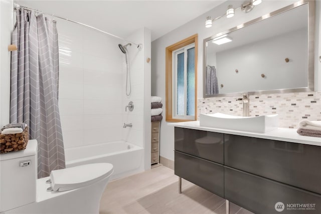 14207 Evergreen Way, Stanwood, WA 98292 - full bath featuring toilet, vanity, shower / tub combo with curtain, and backsplash