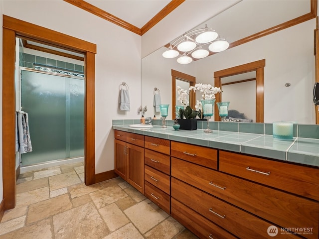 28235 SE 268th St, Ravensdale, WA 98051 - bathroom with ornamental molding, stone tile flooring, a stall shower, double vanity, and a chandelier
