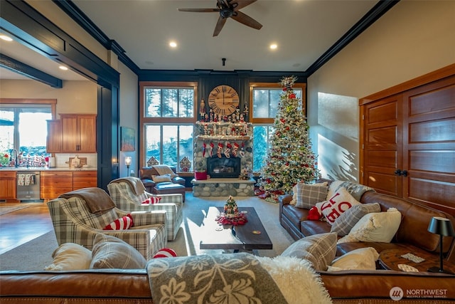28235 SE 268th St, Ravensdale, WA 98051 - living area featuring ornamental molding, ceiling fan, plenty of natural light, recessed lighting, and a fireplace