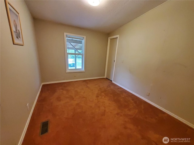 669 Duck Lake Dr NE, Ocean Shores, WA 98569 - carpeted spare room with baseboards