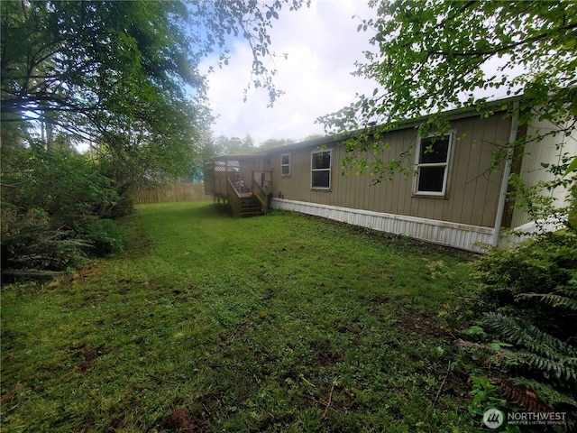 669 Duck Lake Dr NE, Ocean Shores, WA 98569 - view of green lawn featuring stairs