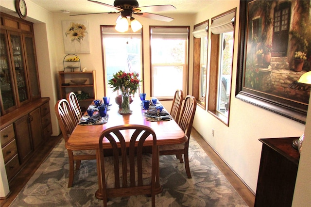 1427 100th St SW Unit 149, Everett, WA 98204 - dining area featuring dark wood finished floors and ceiling fan
