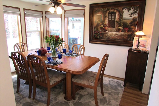 1427 100th St SW Unit 149, Everett, WA 98204 - dining area featuring a ceiling fan and wood finished floors