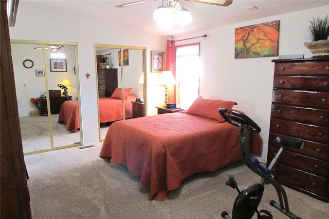 1427 100th St SW Unit 149, Everett, WA 98204 - bedroom featuring multiple closets, carpet, and a ceiling fan