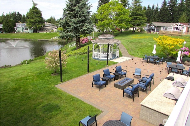 1427 100th St SW Unit 149, Everett, WA 98204 - view of patio / terrace with a gazebo, a water view, and an outdoor fire pit